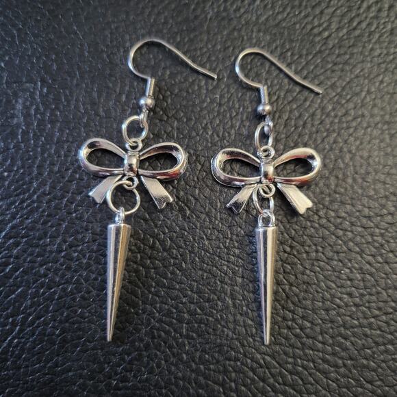Spiked bow earrings, stainless steel hooks - Picture 1 of 2